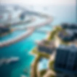 Aerial view of Blue Waters Bay showcasing modern residences and vibrant community spaces